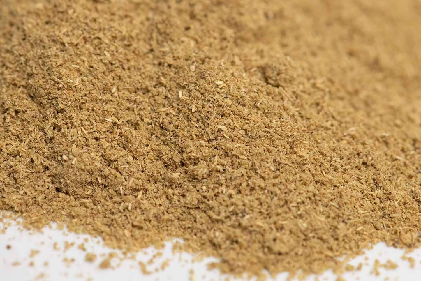 Close-up of ground spice blend with fine texture, ideal for cooking and seasoning dishes