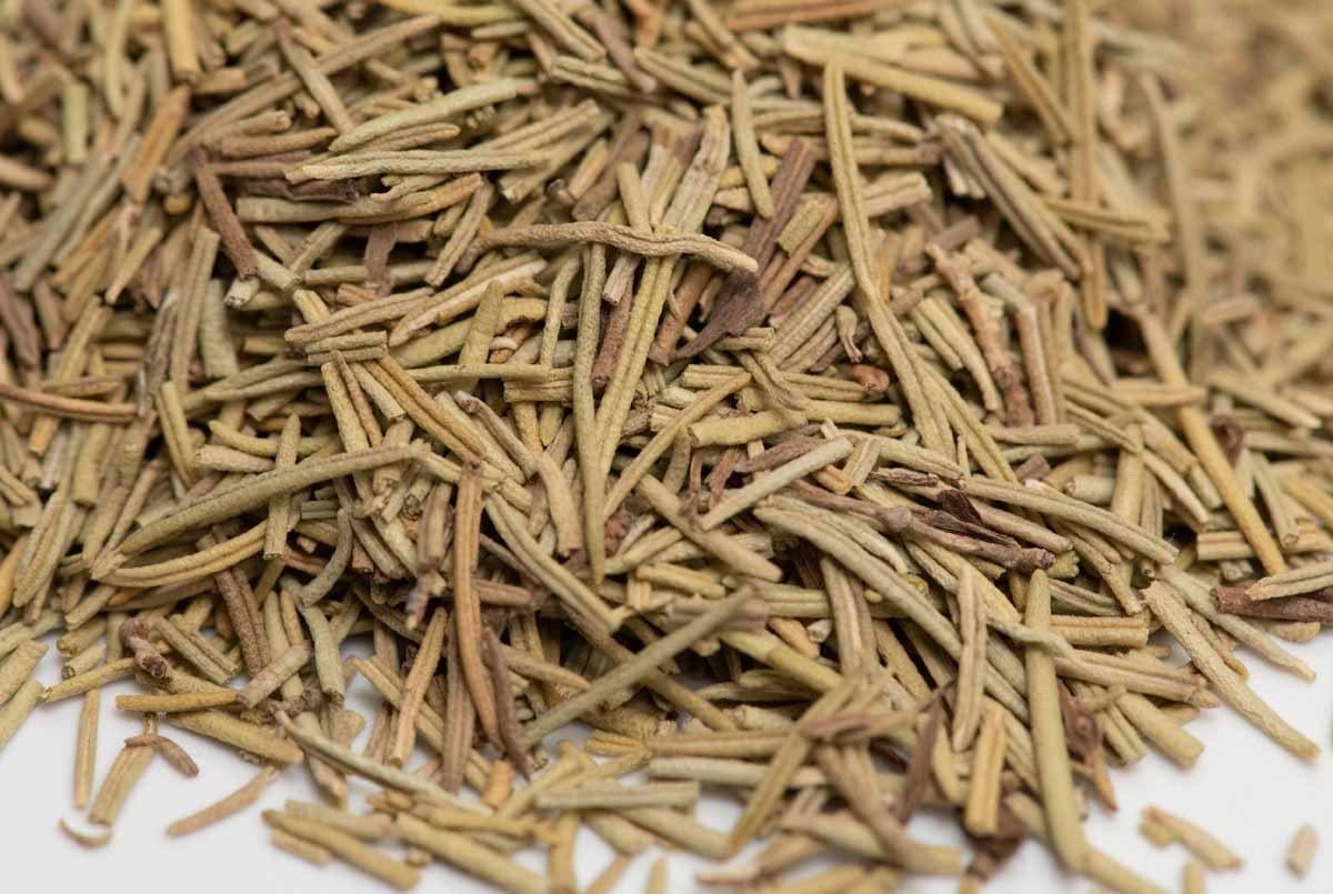 Close-up of dried rosemary leaves, aromatic herb for cooking and seasoning.