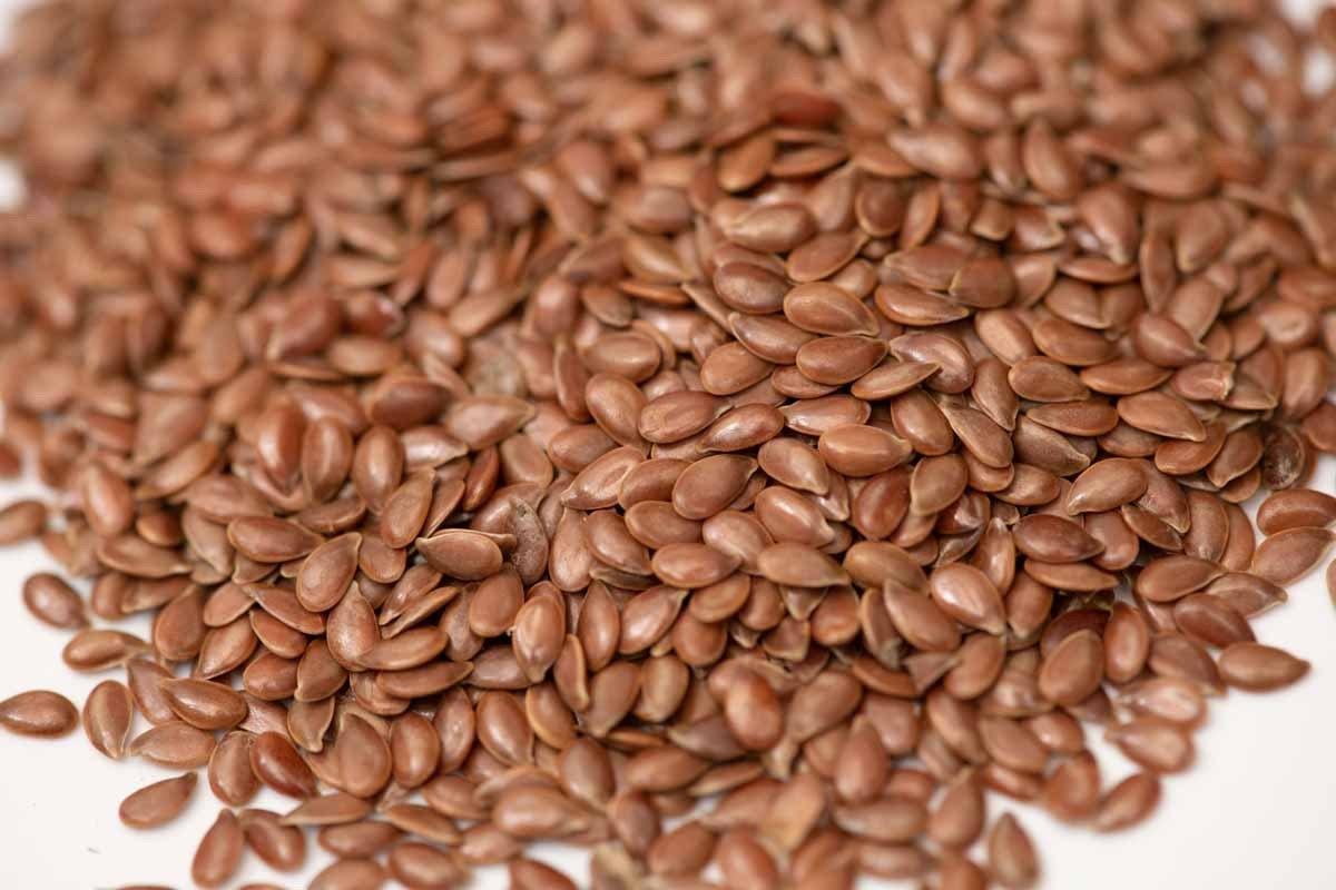 Close-up of whole brown flax seeds for cooking and baking