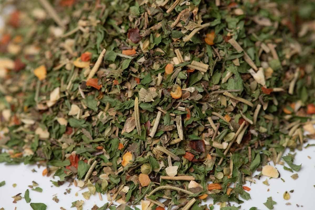 Close-up of mixed dried herbs and spices blend for cooking or seasoning.