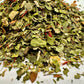 Dried herbs on a white surface