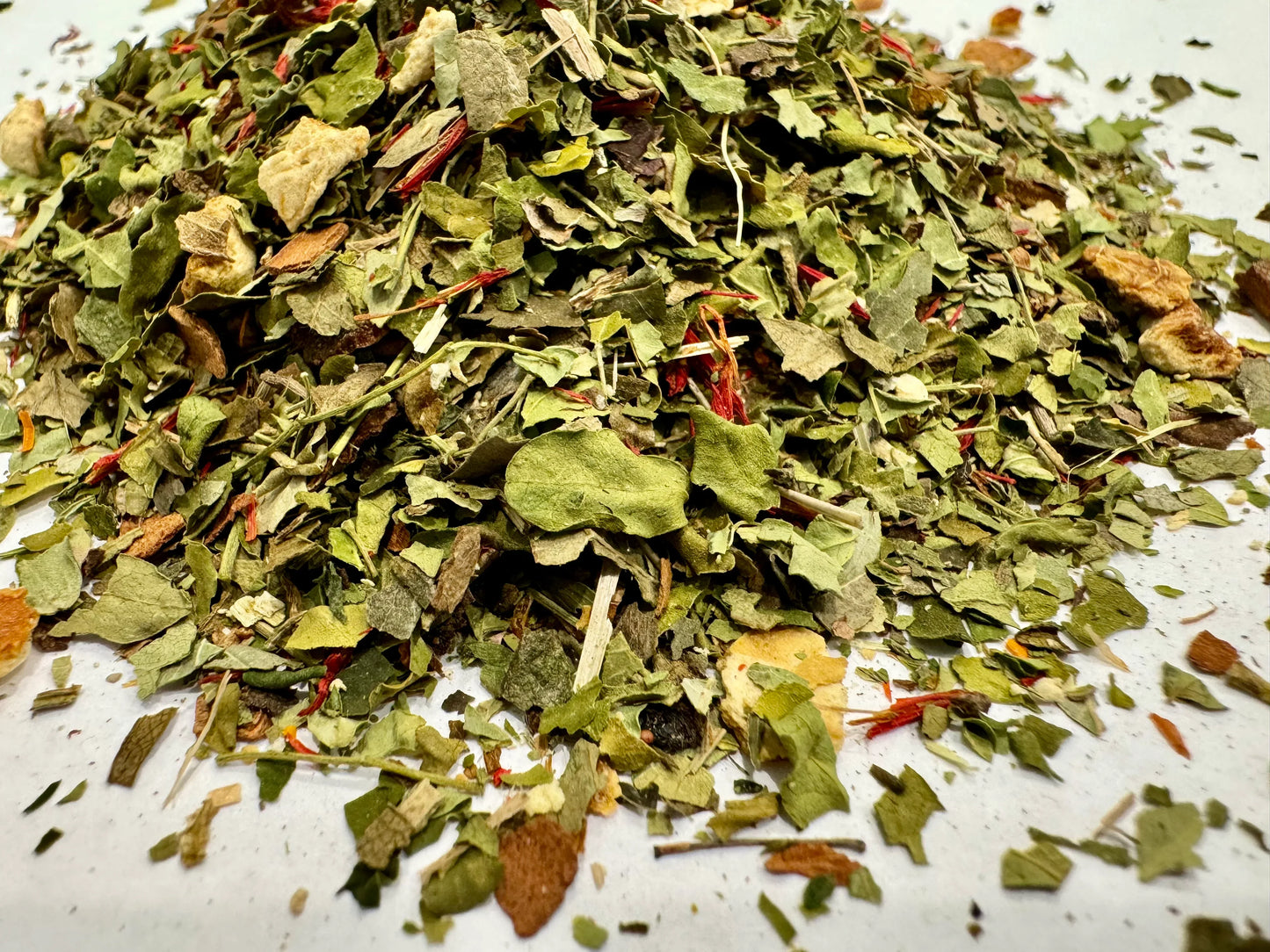 Dried herbs on a white surface