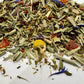 Mixture of dried herbs and flowers on a white background