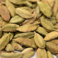 Whole green cardamom pods close-up, aromatic spice for cooking and tea blends